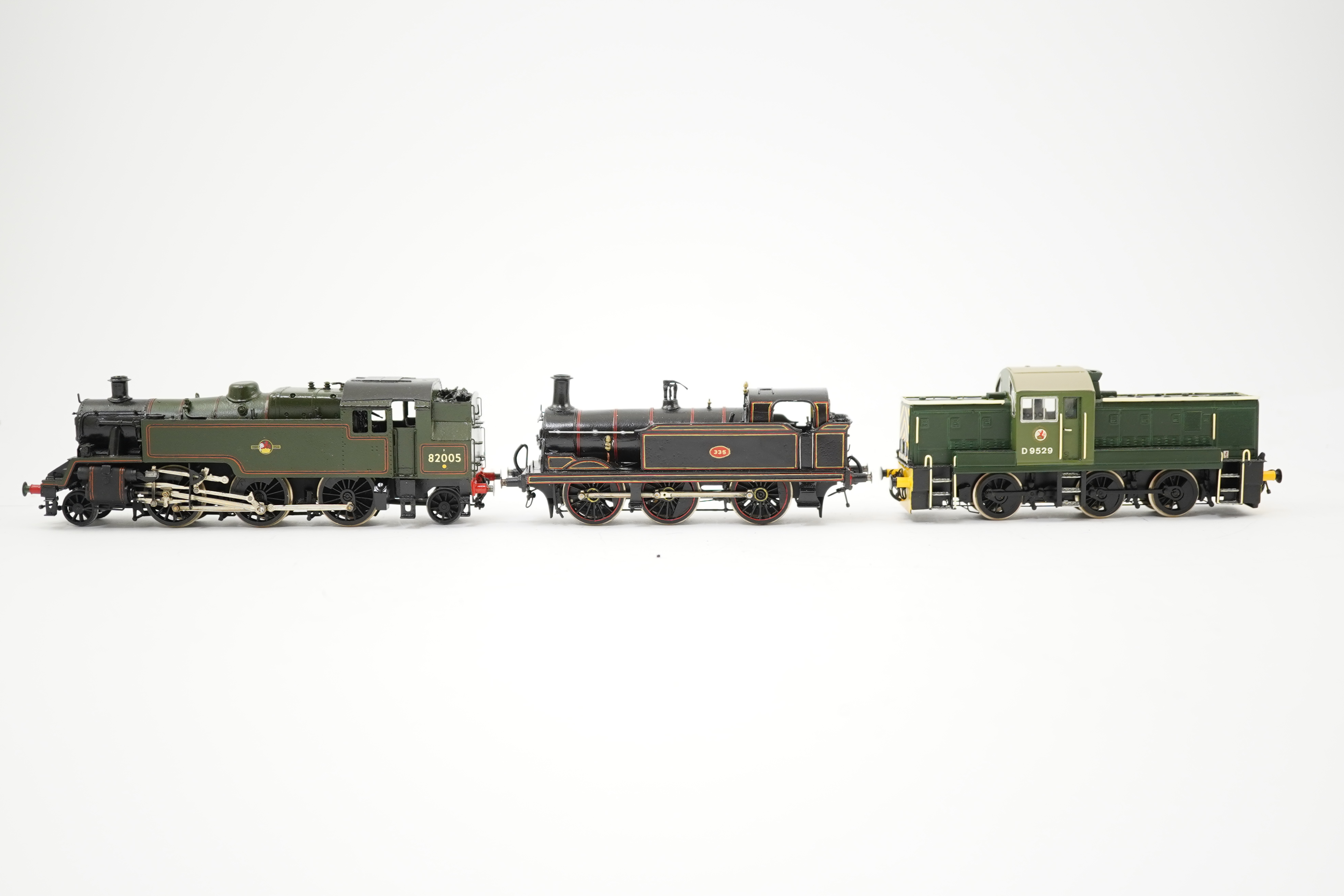 Three 00 gauge brass and white metal kit built locomotives; an SER Sterling R class 0-6-0T, 335, together with a BR Standard class 3 2-6-2T, 82005, and a BR class 14 0-6-0 diesel hydraulic locomotive, constructed, painte